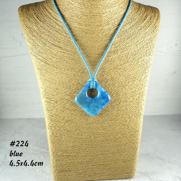 Fused glass pendant on a waxed cord, rhombus diamond shaped, 5 colours