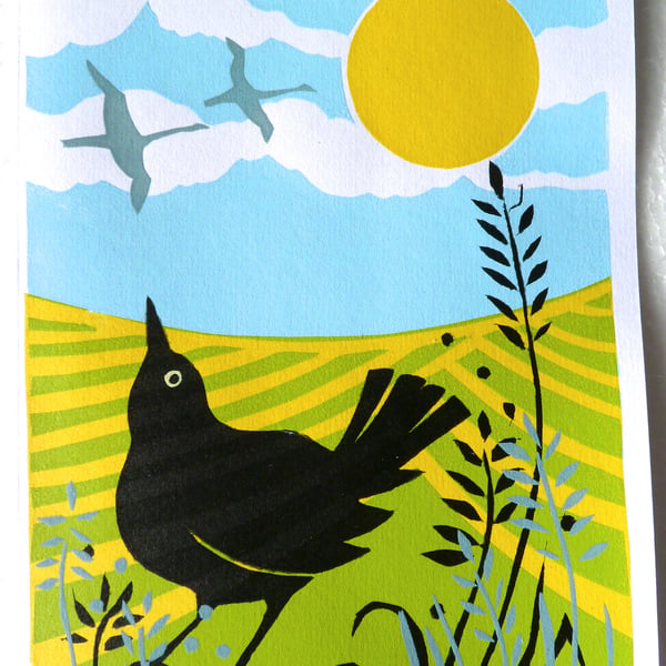 A delightful screen printed card of a blackbird and swans