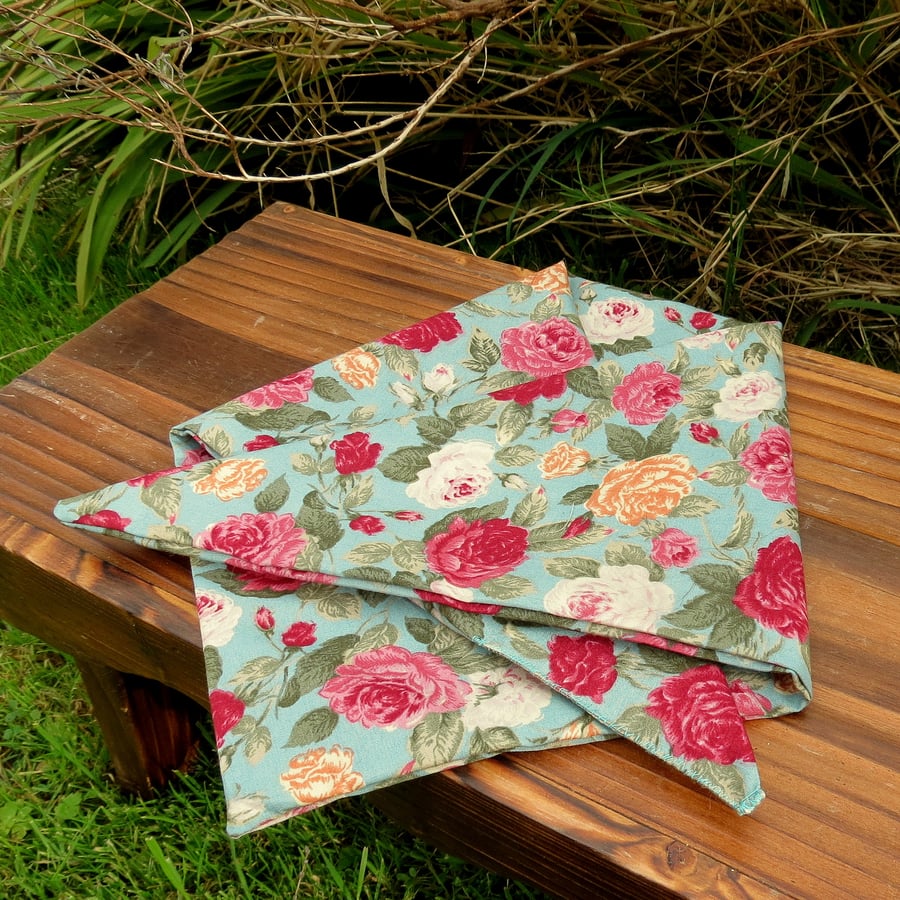 A floral dog bandana.  Size medium.  61cm x 25.5cm.