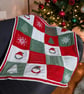 Hand Knitted Christmas Blanket with Red Tartan Fleece Backing