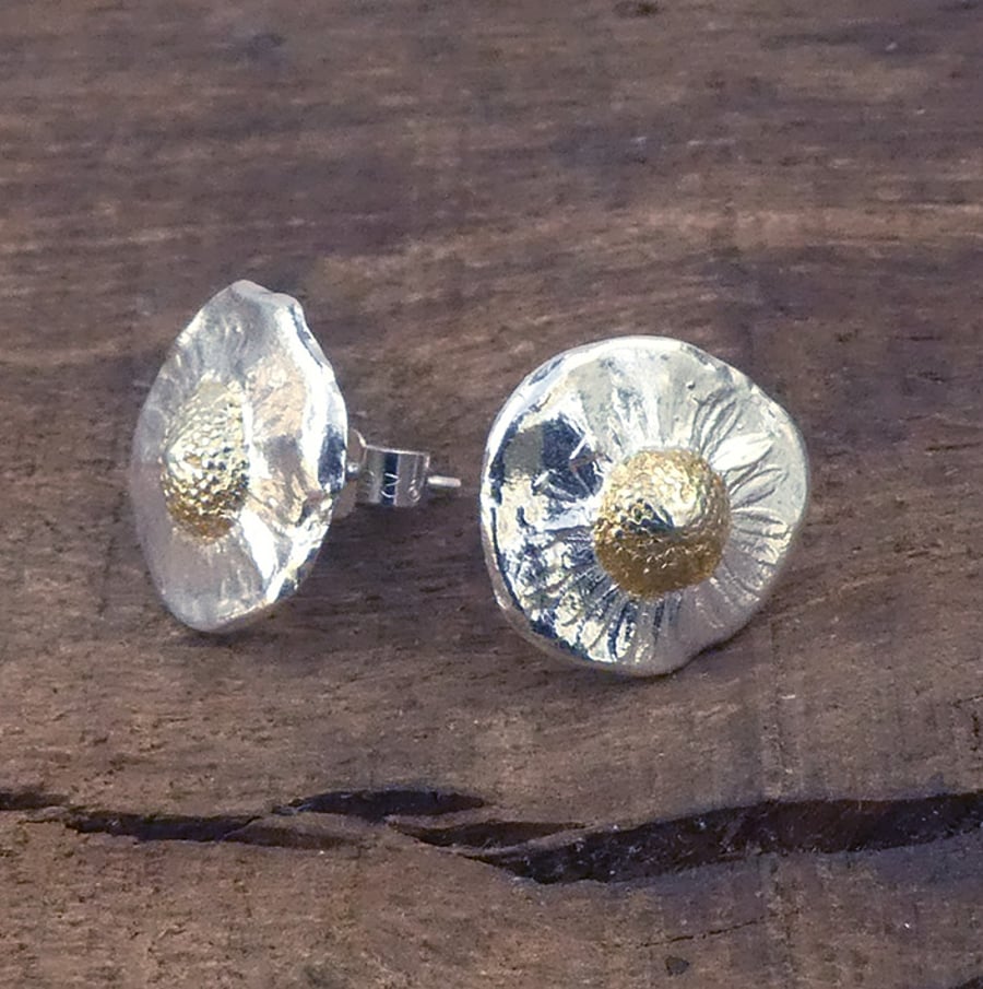 Silver daisy studs with gold centres