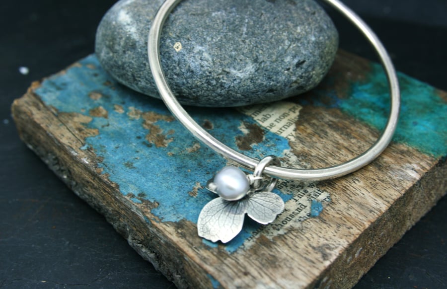 Sterling silver bangle with hydrangea flower charm and pearl