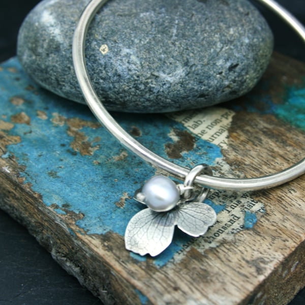 Sterling silver bangle with hydrangea flower charm and pearl