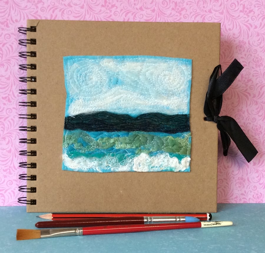 Square embroidered seascape sketchbook or journal. 