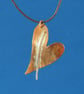 Heart Shot Copper and Silver Pendant - Image 1