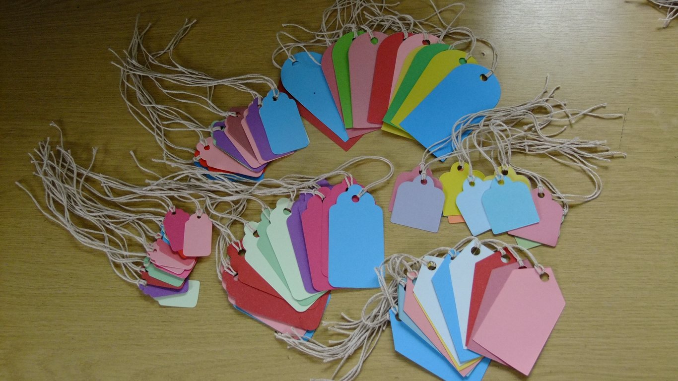 60 gift tags assorted shaped Sizzix die cuts for card embellishments & crafting.