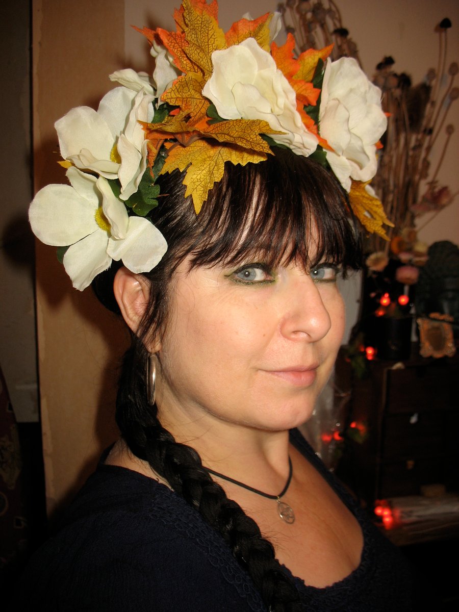 Beautiful autumnal white anemone and leaf headband headdress
