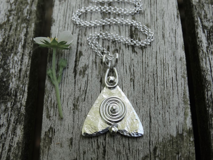 Midsummer moth with sun motif recycled silver pendant