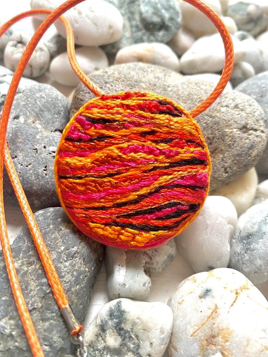 Warm autumnal colours, hand embroidered pendant 
