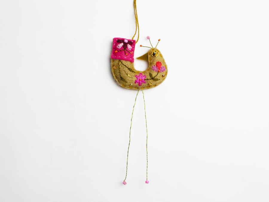 Marzipan coloured felt hanging bird ornament with folk embroidery