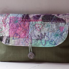 Textile art clutch bag in lilac, pink and green 