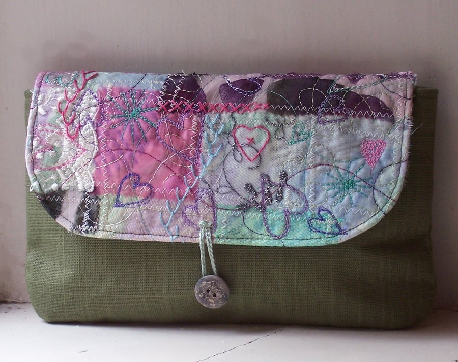 Textile art clutch bag in lilac, pink and green 