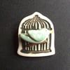 little bird cage brooch