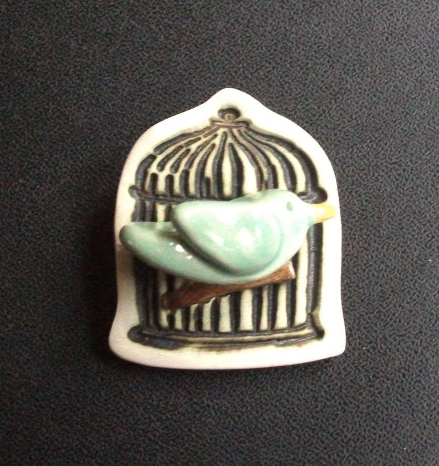 little ceramic bird cage brooch