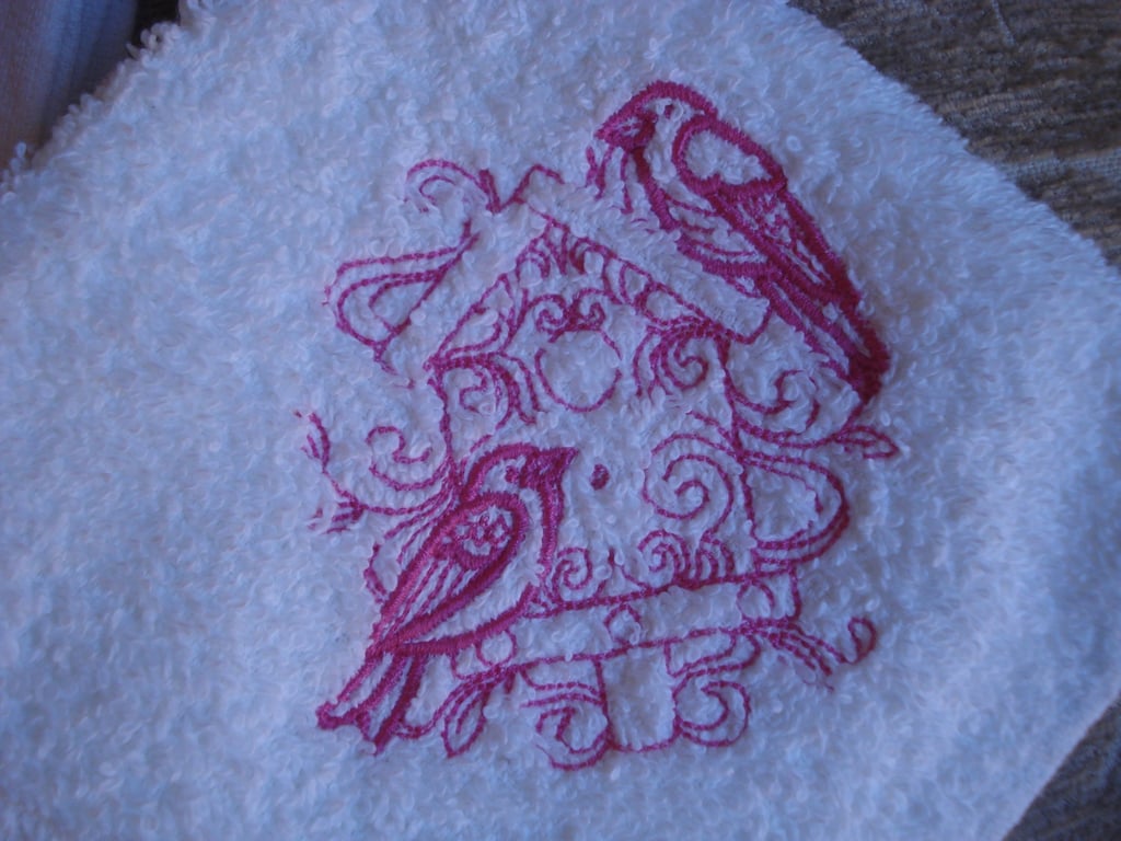 Embroidered Hand Towel And Flannel With Bird Box And Bird Detail 