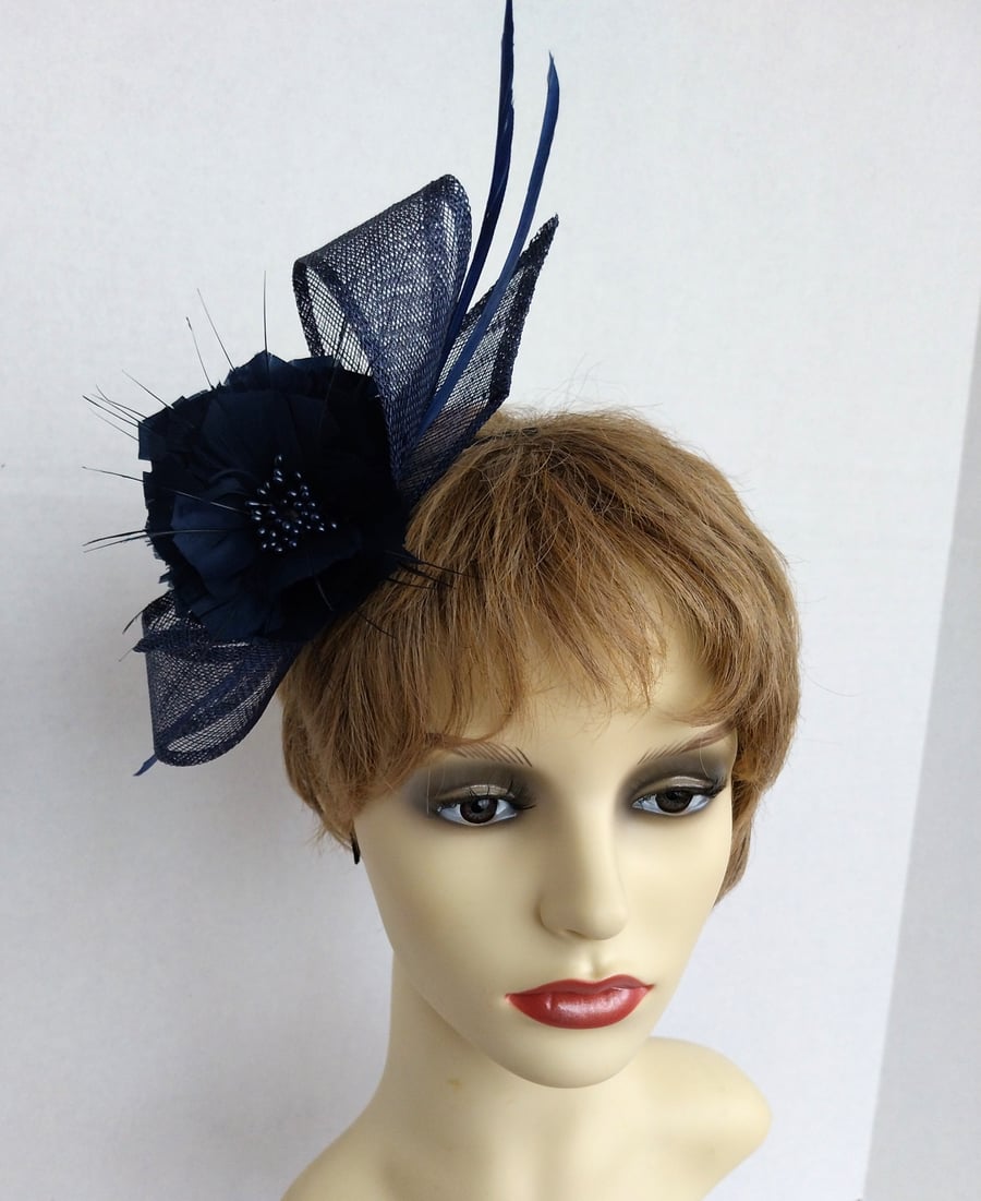 Frances Navy blue sinamay loops with a feather flower