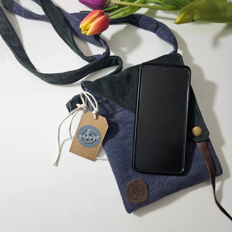 Crossbody bag or belt purse in corduroy fabric.
