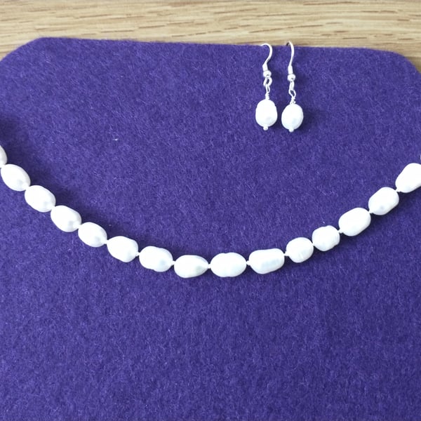 Hand knotted freshwater pearl necklace and earrings 