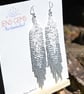 White & Silver Beadwork Tassel Earrings - Image 1