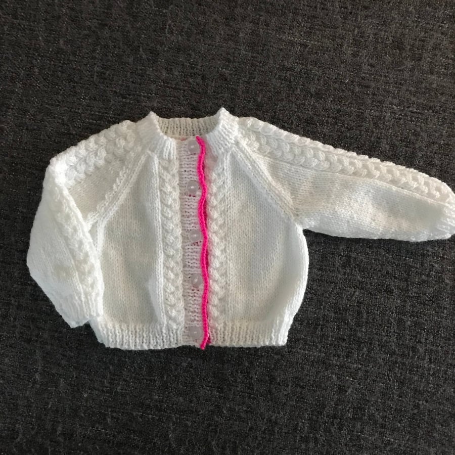 White and pink cable cardigan , hand knitted