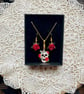 Rose skull necklace and earring set