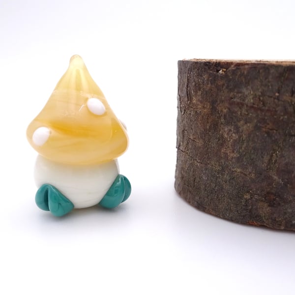 small glass toadstool figure