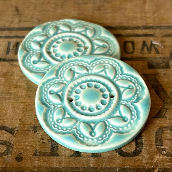 Set of two handmade ceramic buttons