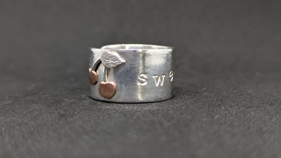 Handmade sterling silver band ring with copper cherries