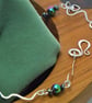 Handcrafted wavy necklace with Hematite rainbow beads - Image 2