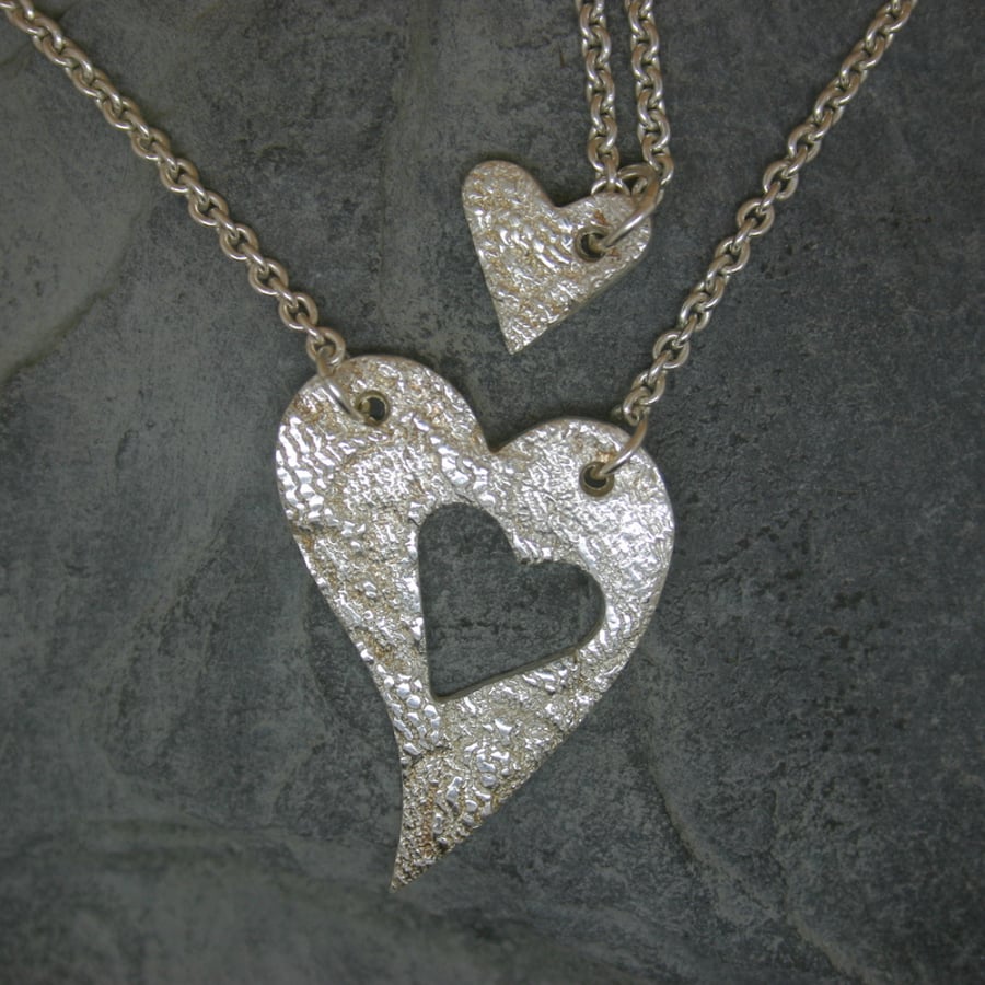Mummy and Me. Two fine silver patterned heart pendants