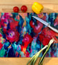 Carnival Floral Glass Chopping Board, Vibrant Circular or Rectangular Design - Image 1