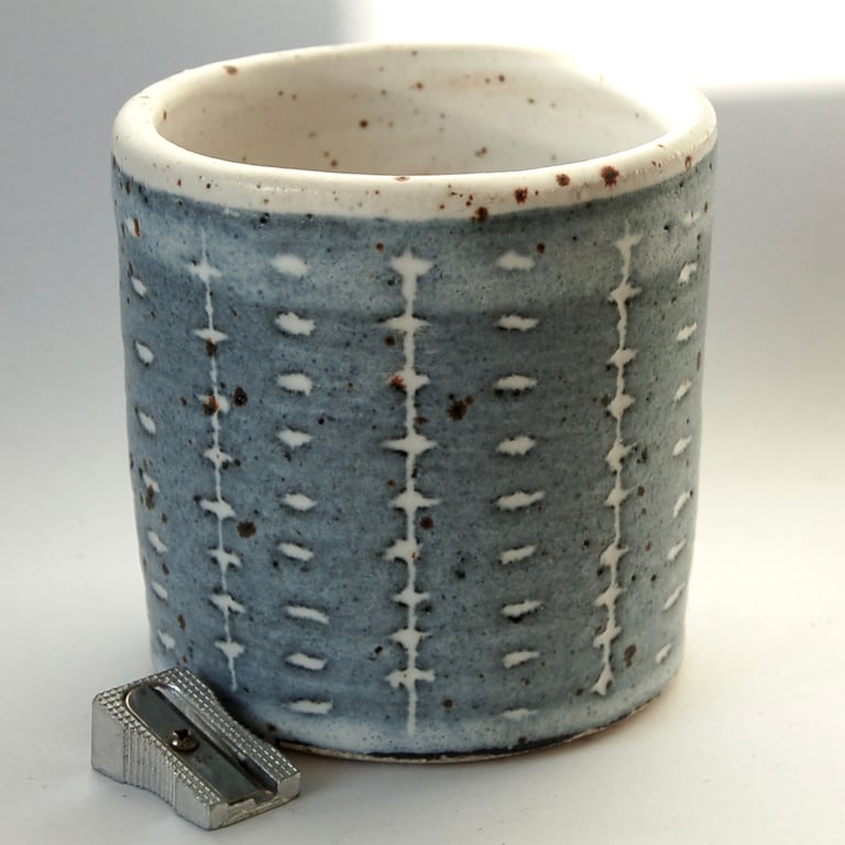Small modern stoneware vase with matt glaze and sgraffito decoration