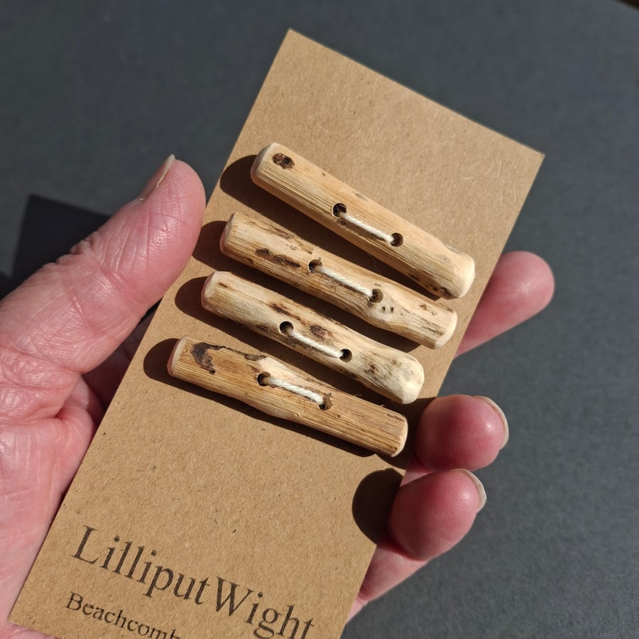 Four driftwood toggle buttons