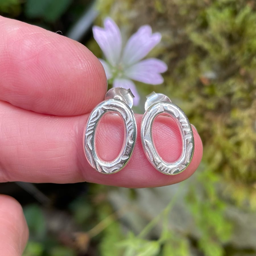 Sterling silver patterned oval stud earrings