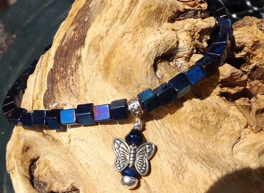 Blue hematite stretch bracelet with butterfly charm