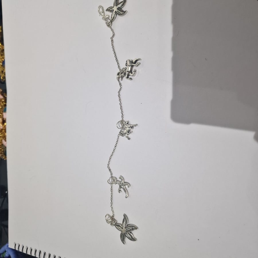 Mixed charm silver bracelet