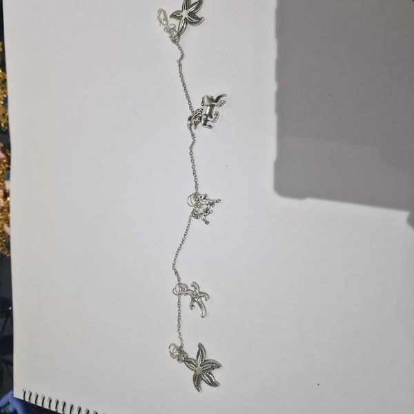 Mixed charm silver bracelet