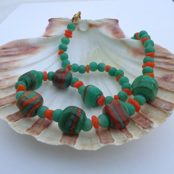 Necklace of tangerine & green beads