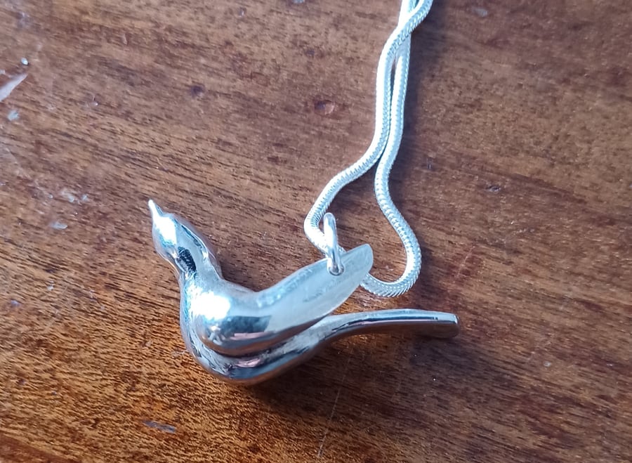Sterling silver bird pendant