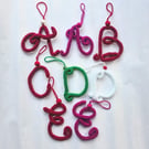 Sparkly knitted wire letter decorations