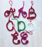 Sparkly knitted wire letter decorations