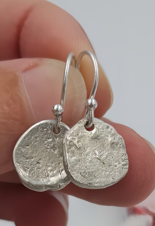Front-Facing Small Molten Silver Drops