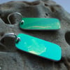 Green and gold rectangular earrings