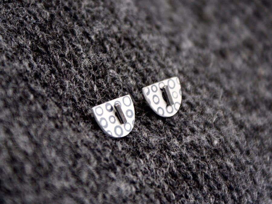 Black dotty studs