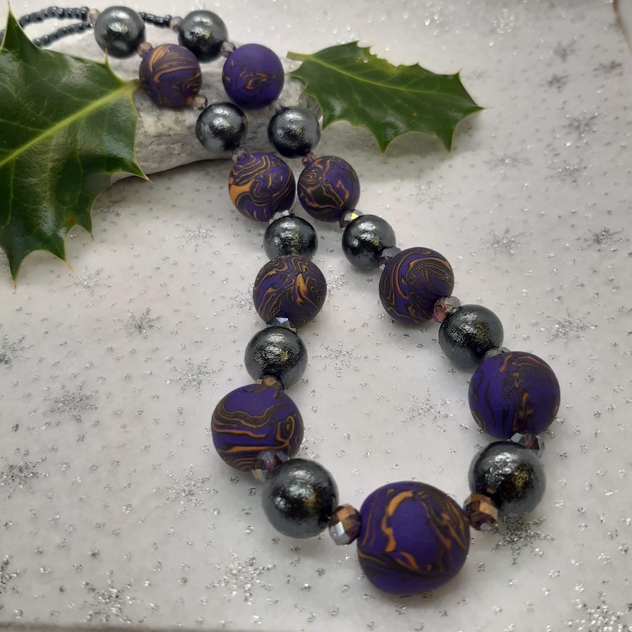 Dark purple and gold polymer clay necklace