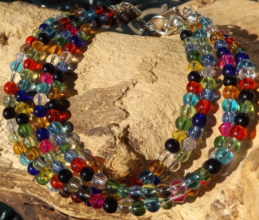 Multi coloured glass bead and crystal bracelet with toggle clasp