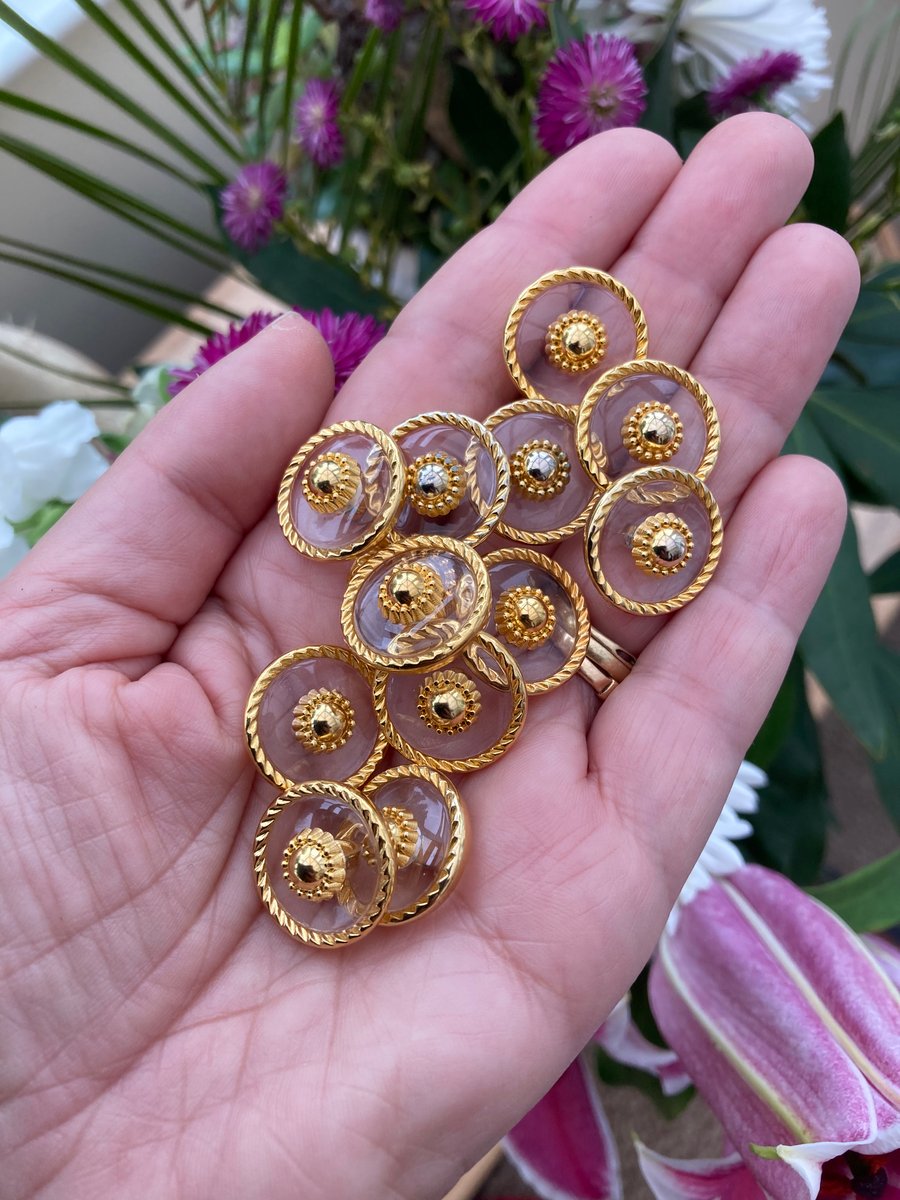 A Set of 13 Shield Design Round Lucite Vintage Buttons for Crafting Project.