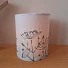 Handprinted handcrafted LED lantern featuring a cow parsley design.