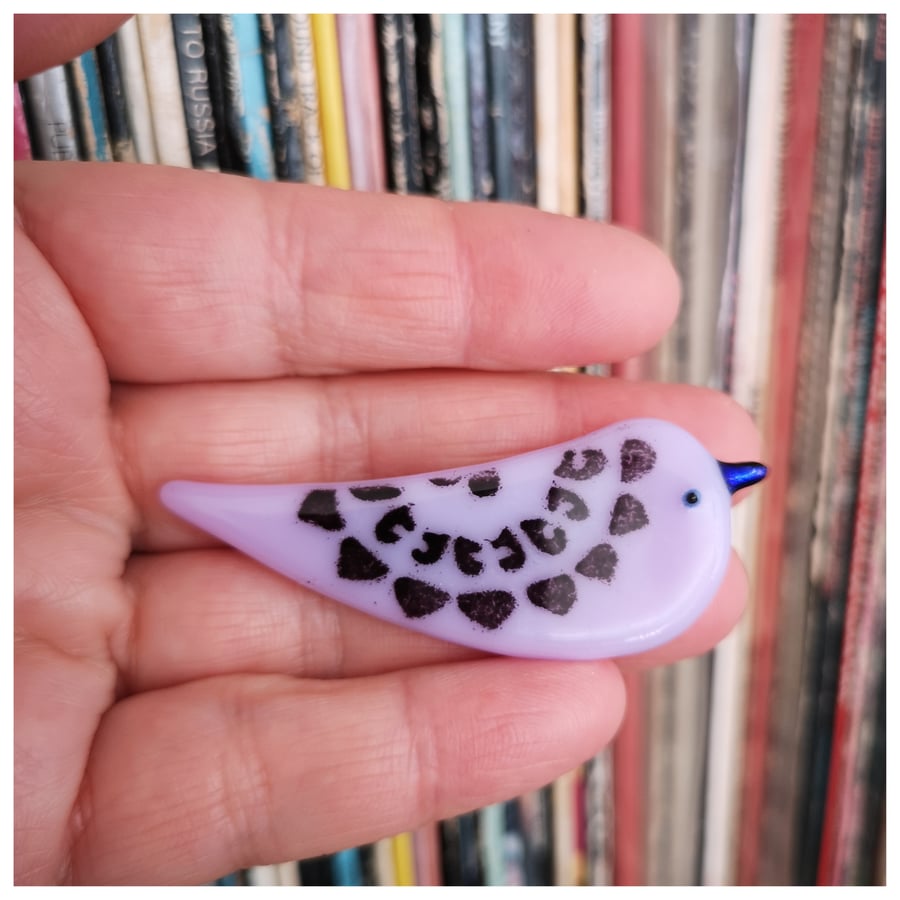 lavender bird brooch with dark blue beak