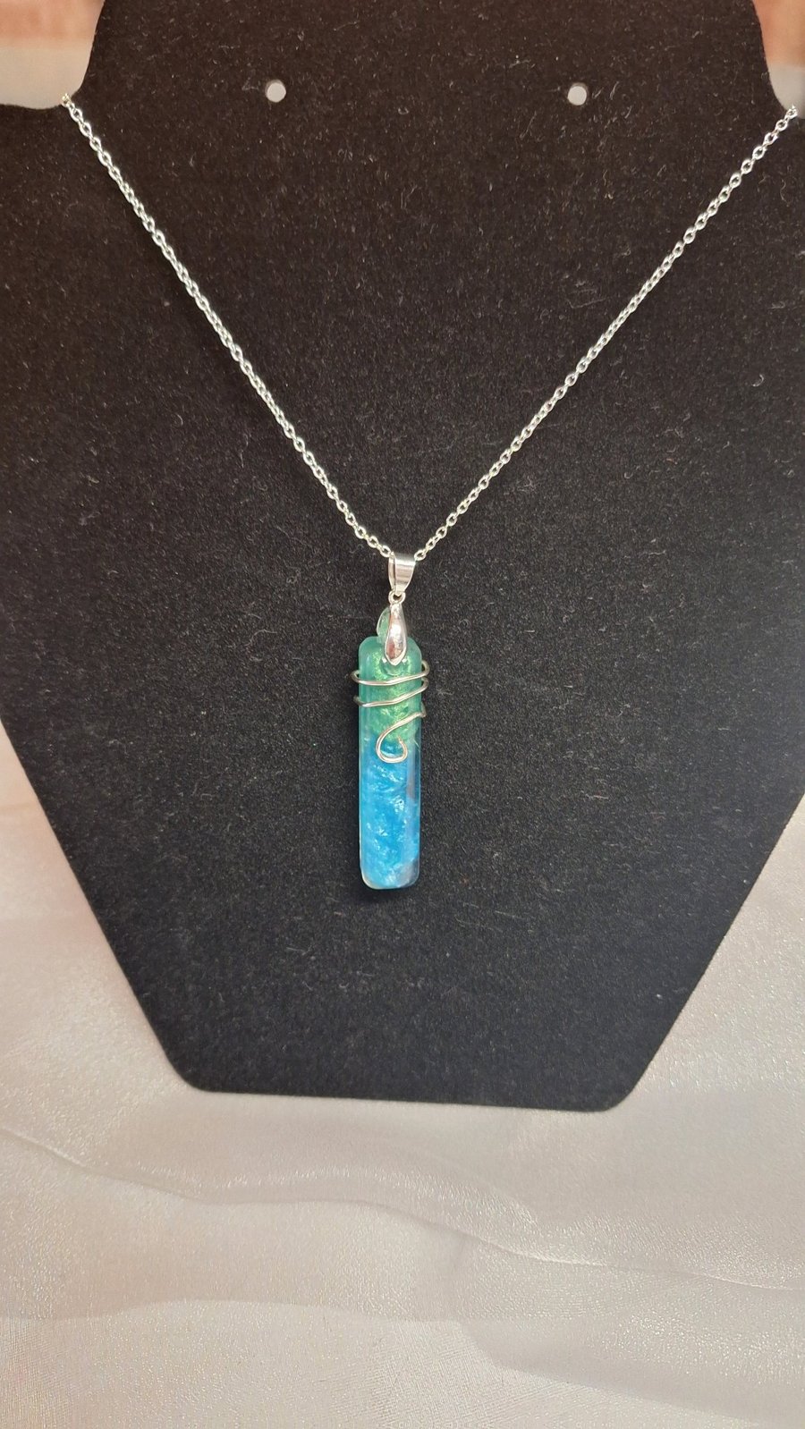 Blue resin wire wrapped silver pendant